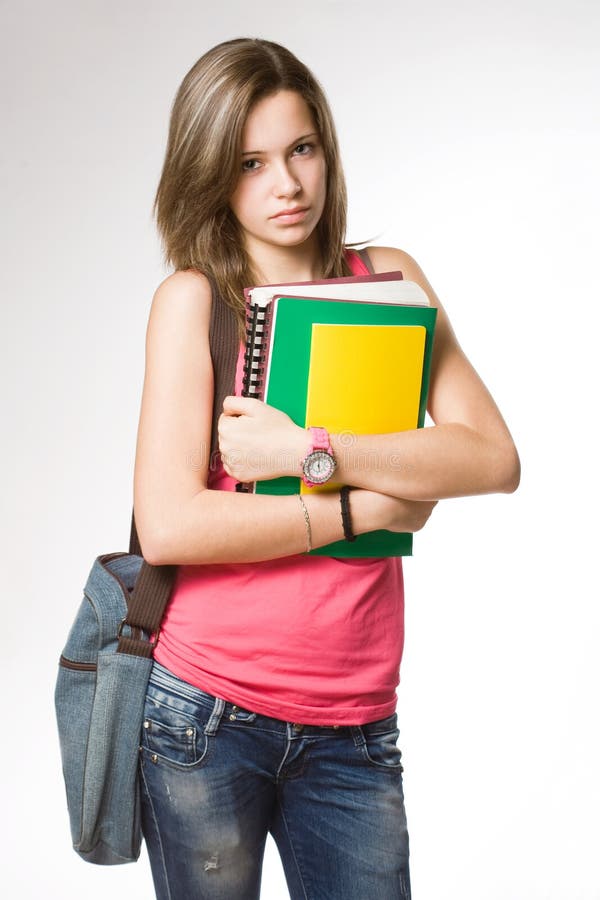 Arrabbiato, frustrato sembrando la giovane ragazza dello studente. fotografia stock libera da diritti Arrabbiato, frustrato sembrando la giovane ragazza dello studente. fotografia stock libera da diritti
