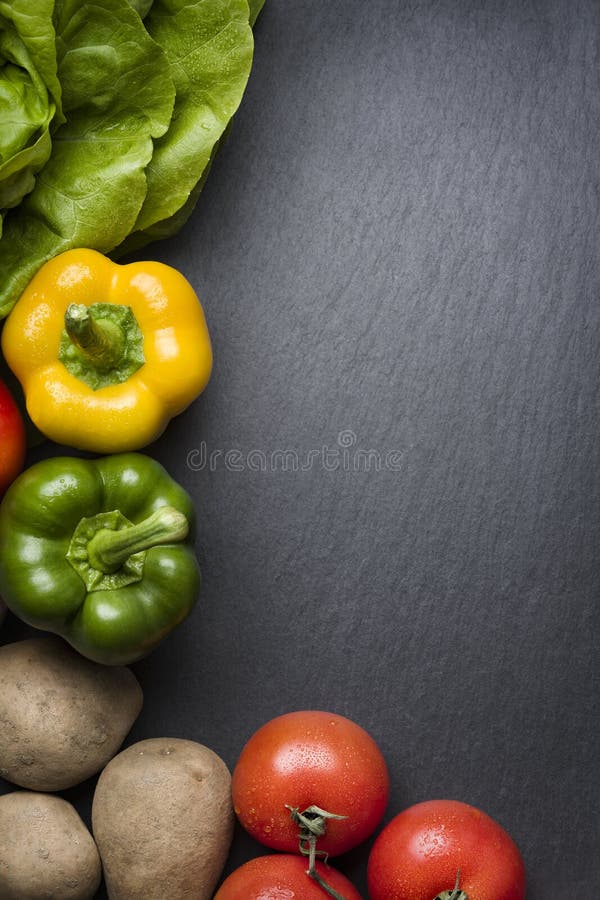 Arrangement with colorful mixed vegetables and blank copyspace. stock photo
