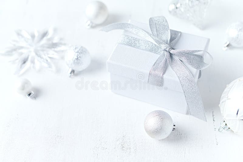An arrangement of gift boxe and Christmas decorations on white background. Symbolic image. Close up. Copy space royalty free stock image An arrangement of gift boxe and Christmas decorations on white background. Symbolic image. Close up. Copy space royalty free stock image