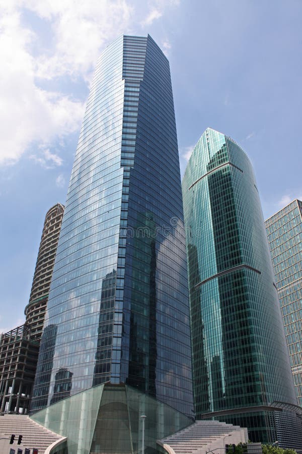 Low angle view of offices buildings skyscraper in Shanghai, China. Low angle view of offices buildings skyscraper in Shanghai, China