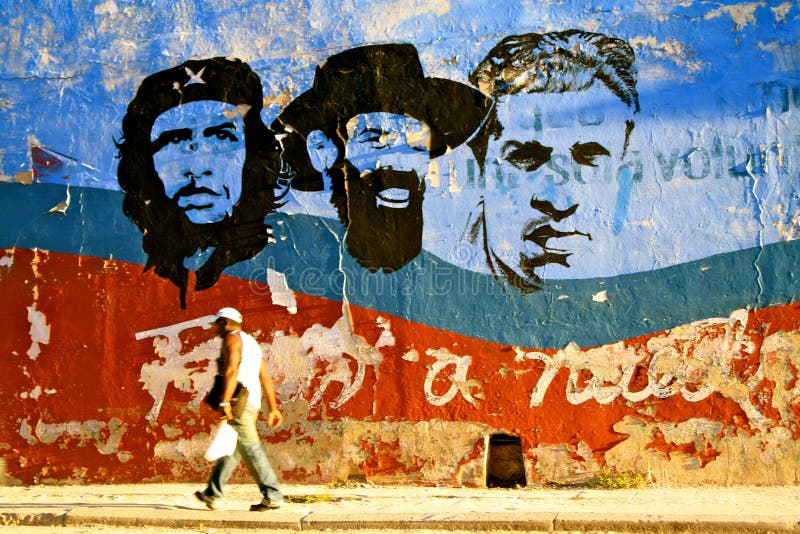 Wall painting shoowing the faces of three cuban leaders (Che Guevara, Cienfuegos and ?) in Havana. Wall painting shoowing the faces of three cuban leaders (Che Guevara, Cienfuegos and ?) in Havana.