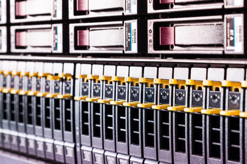 Array of data storage hard drives in internet data center stock images