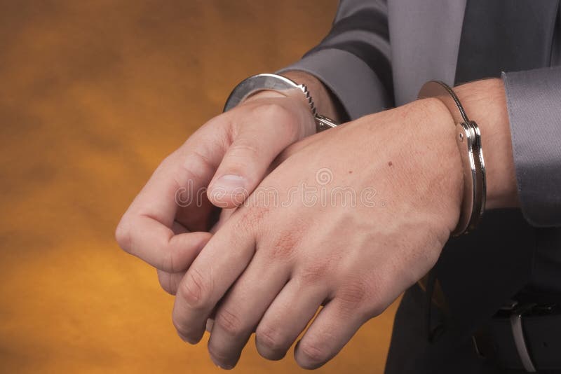 Arrest handcuffs stock photo. Image of handcuffs, apprehension 16761136