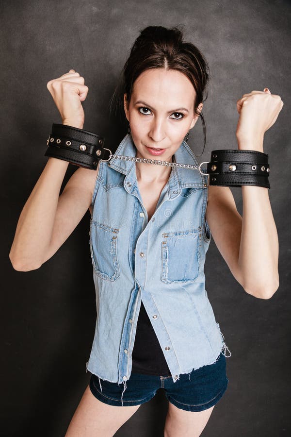 Arrest and Jail. Criminal Woman Prisoner Girl in Handcuffs Stock Photo ...