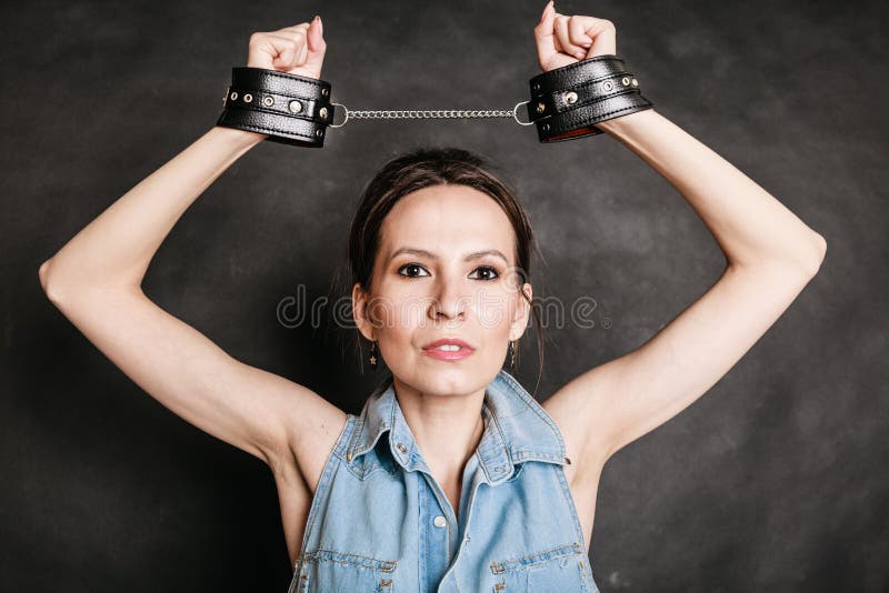 Arrest and Jail. Criminal Woman Prisoner Girl in Handcuffs Stock Photo ...