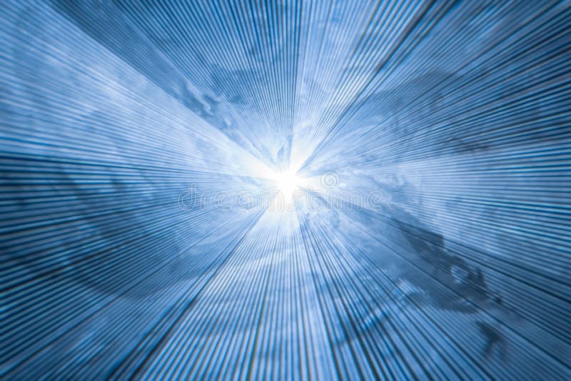 Arrière-plan bleu abstrait avec des rayons lumineux divergents photographie stock Arrière-plan bleu abstrait avec des rayons lumineux divergents photographie stock