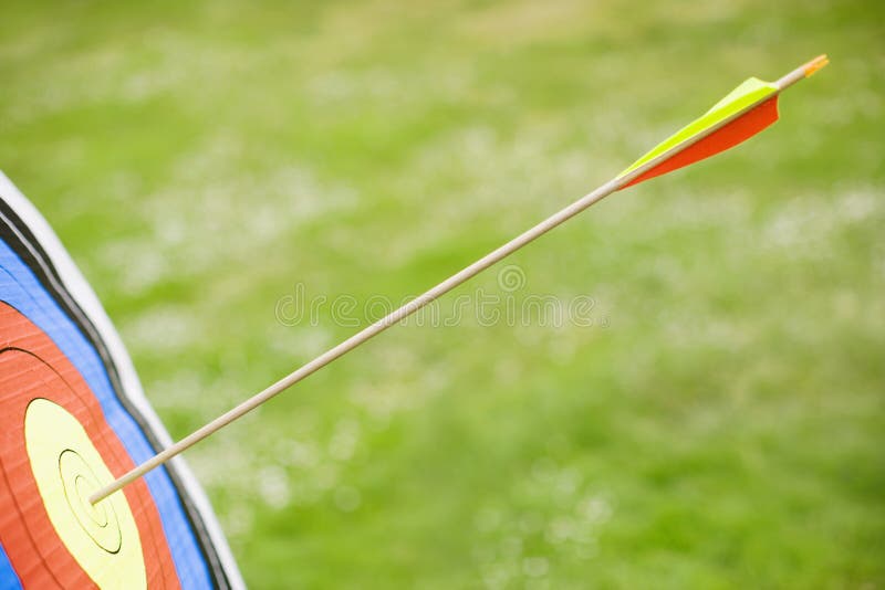 Arrow in bullseye of target (close-up)