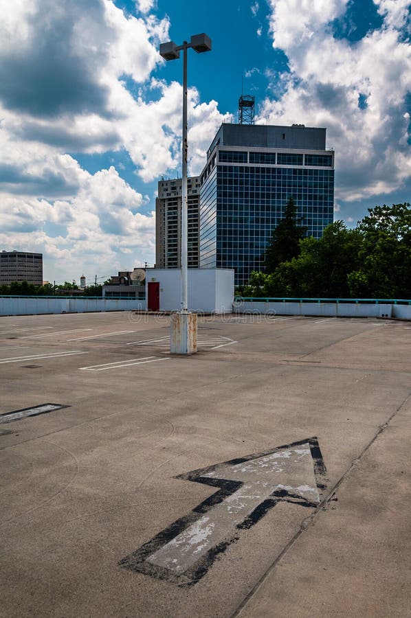 Arrow and View of Highrises from a Parking Garage in Towson, MD Stock