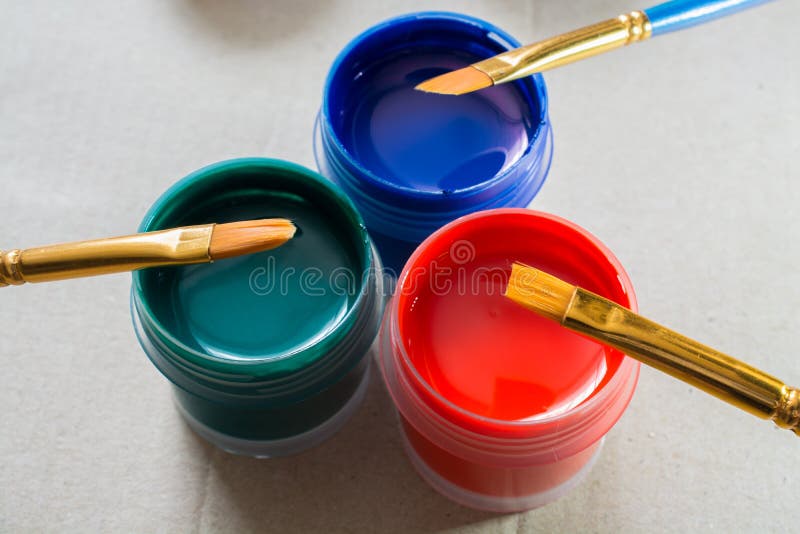 Art Brushes and Few Jars with Acrylic Paint. Stock Image Image of