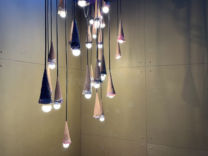 Lamp Attached To an Ice Cream Cone Hanging on the Cable Stock Photo