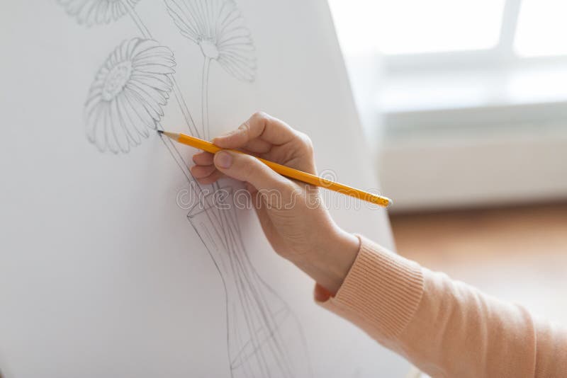 Artist with pencil drawing picture at art studio stock images Artist with pencil drawing picture at art studio stock images