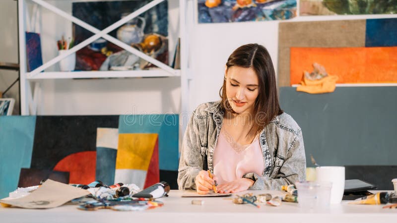 art hobby artist lifestyle woman drawing in studio