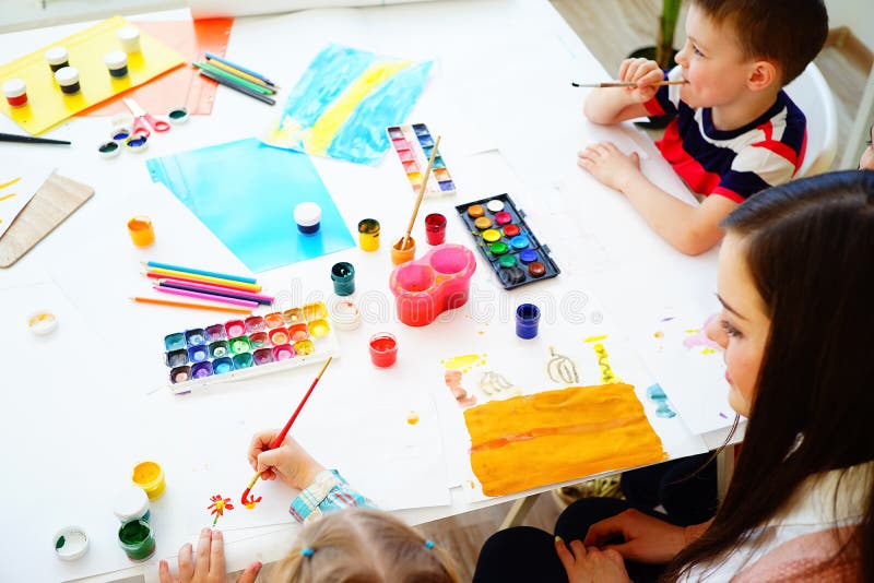 Art lesson in kindergarten stock photo. Image of brush 91677854