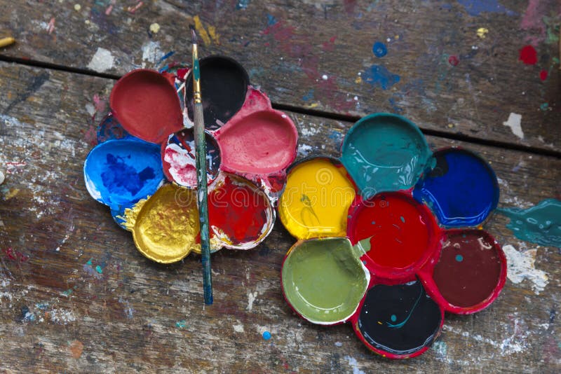 Art palette and brush paiting stock photos