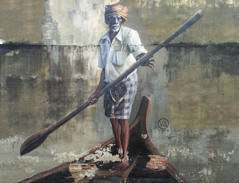 PENANG, MALAYSIA-2018-01-04: Public street art in Georgetown `Old man with a paddle on a boat`, Penang, Malaysia. PENANG, MALAYSIA-2018-01-04: Public street art in Georgetown `Old man with a paddle on a boat`, Penang, Malaysia