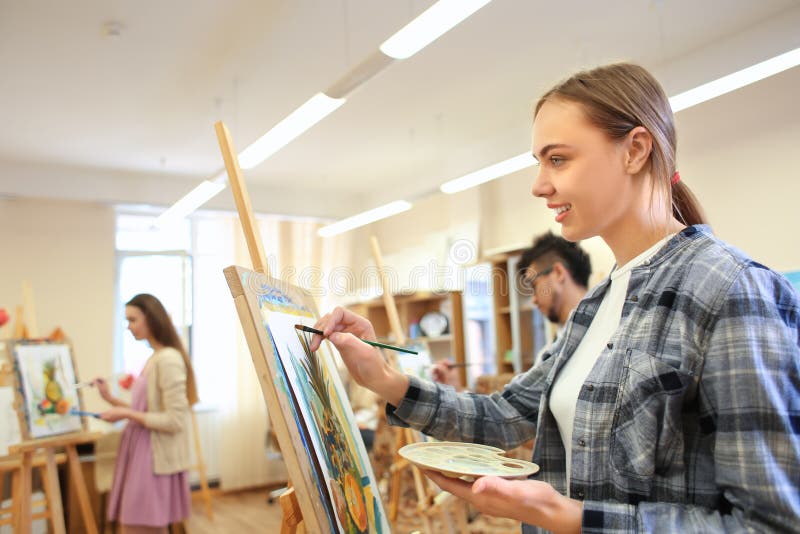 Art Students Painting in Stock Photo Image of professional