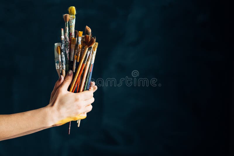 Art supplies tools talent paintbrushes hands