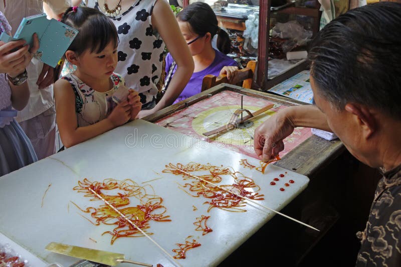 Artesanatos populares chineses, pintura do açúcar imagem de stock