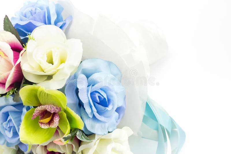 Artificial flowers on white background