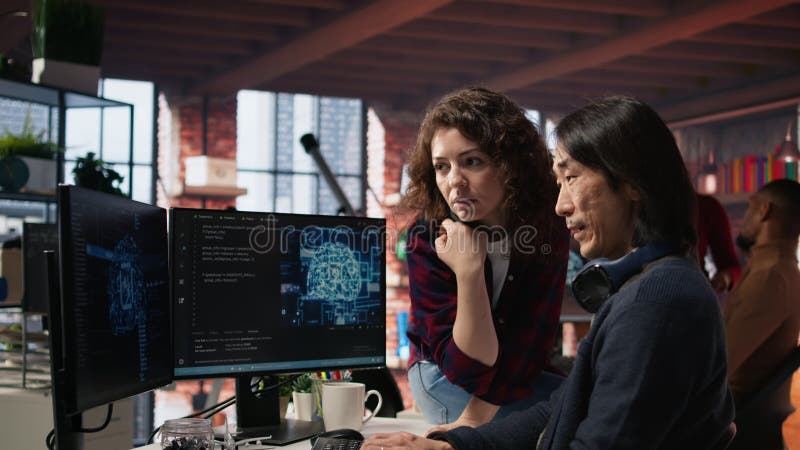 Artificial intelligence tech venture employee requests help from manager stock footage