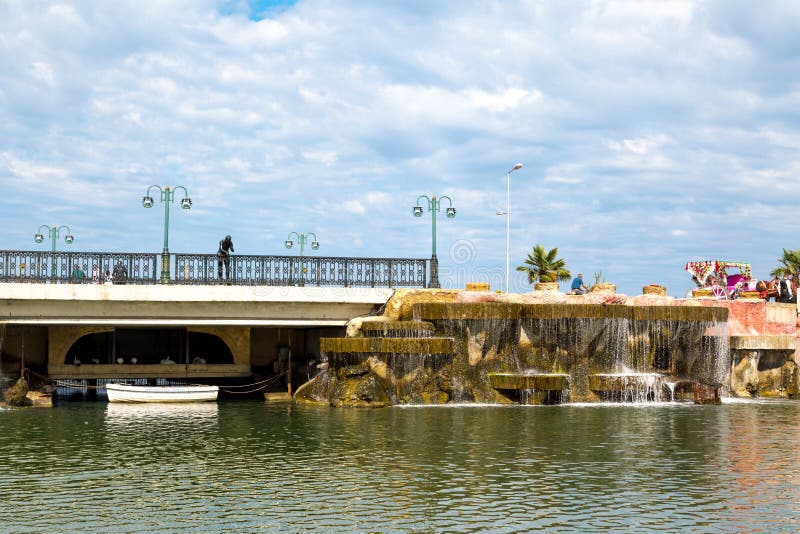 Artificial Waterfall by Small Lake