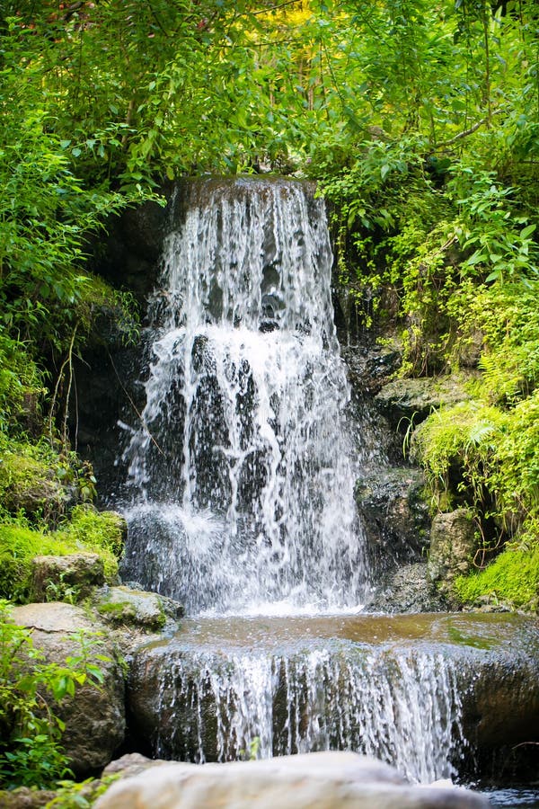 Artificial waterfall stock photo. Image of nature, plant 100917636