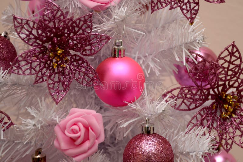 Artificial White Christmas Tree Decorated with Flowers and Balls Stock