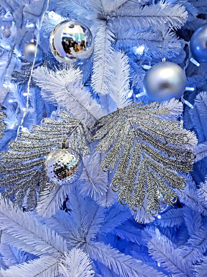Artificial White Christmas Tree Decorated with Christmas Toys Stock