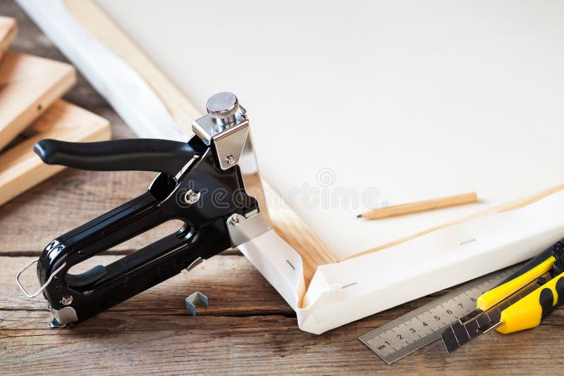 Artist canvas, canvas stretcher and staple gun stock photography Artist canvas, canvas stretcher and staple gun stock photography