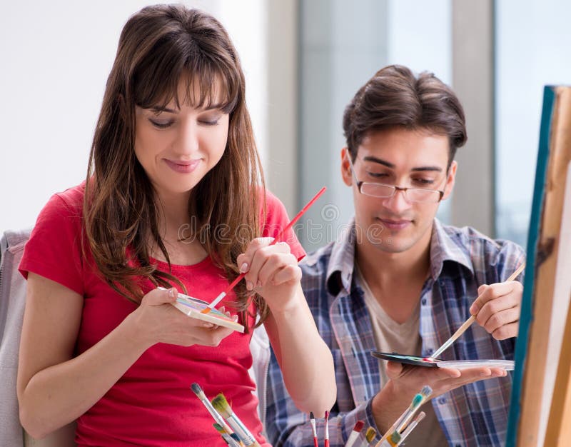 Artist Coaching Student in Painting Class in Studio Stock Image Image