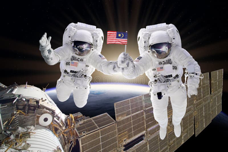 Artist creative edit composite depicting teamwork on ISS stock photo Artist creative edit composite depicting teamwork on ISS stock photo