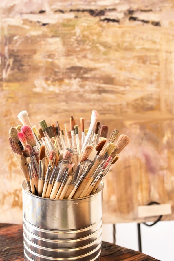 Artist Paint Brushes, Oil Paint on Wooden Artistic Palette Background