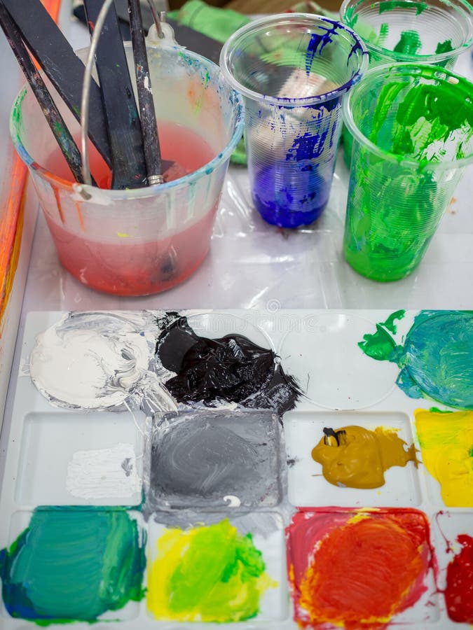 Artist Paint Brushes in White Bucket of Water, Acrylic Colour in Plastic  Cups Stock Photo - Image of brushes, concept: 155799260