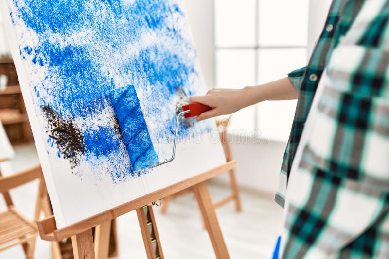 Artist Student Girl Painting Using Paint Roller at Art Studio Stock