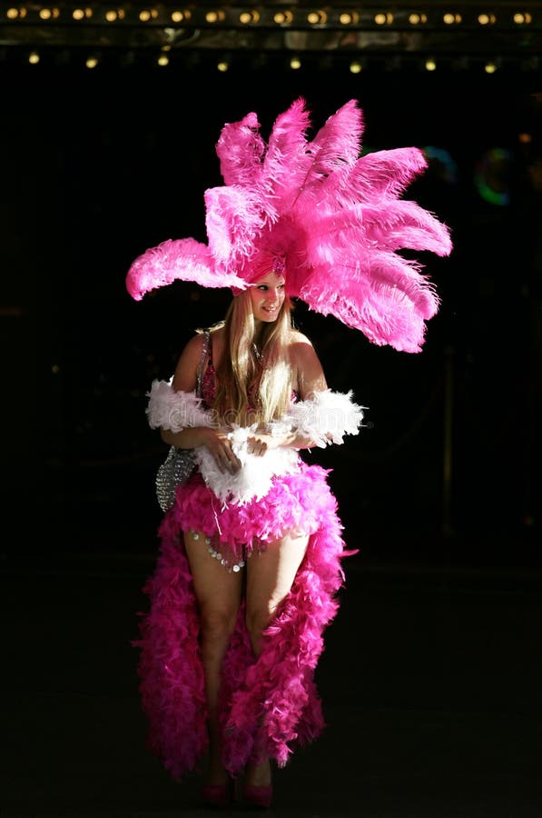 Photo of a beautiful Las Vegas Showgirl in a traditional American showgirl outfit taken downtown Las Vegas. Photo of a beautiful Las Vegas Showgirl in a traditional American showgirl outfit taken downtown Las Vegas.