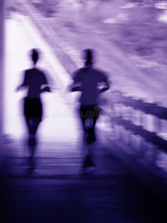 Artistic blur of a running couple royalty free stock photo Artistic blur of a running couple royalty free stock photo