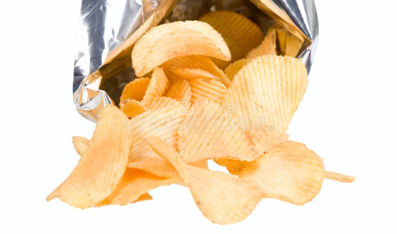 Artistieke spaanders van gouden aardappels stock afbeeldingen Artistieke spaanders van gouden aardappels stock afbeeldingen