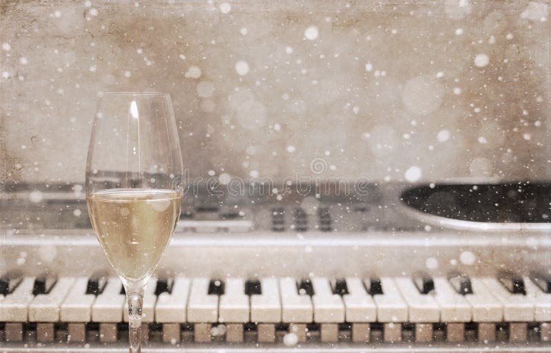 Artwork in vintage style, champagne glass, pianoforte/ snow effect