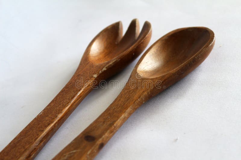 Sustainable wooden items for common use. Sustainable and reusable wooden serving spoons and other shapes of different sizes. Sustainable wooden items for common use. Sustainable and reusable wooden serving spoons and other shapes of different sizes