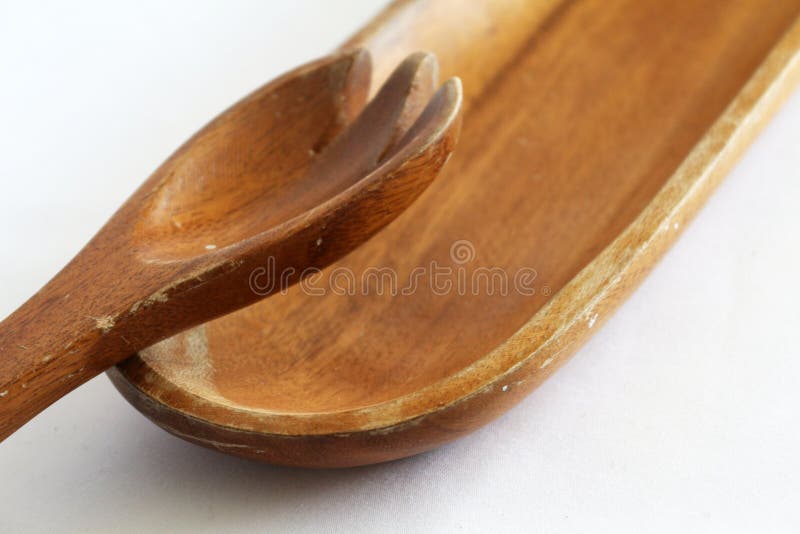 Sustainable wooden items for common use. Sustainable and reusable wooden serving spoons and other shapes of different sizes. Sustainable wooden items for common use. Sustainable and reusable wooden serving spoons and other shapes of different sizes