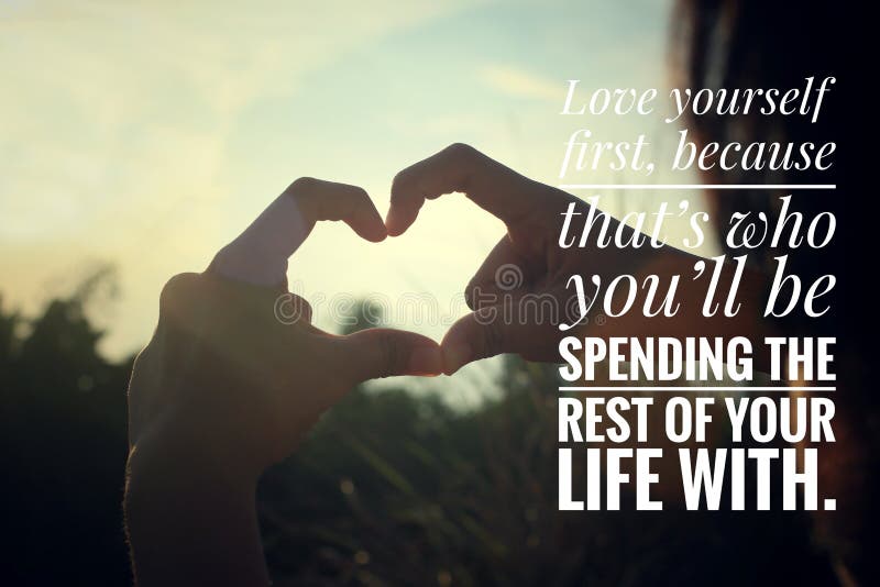 Inspirational motivational quote - Love yourself first, because that is who you will be spending the rest of your life with. With young woman making hands love sign on sunset background. Inspirational motivational quote - Love yourself first, because that is who you will be spending the rest of your life with. With young woman making hands love sign on sunset background