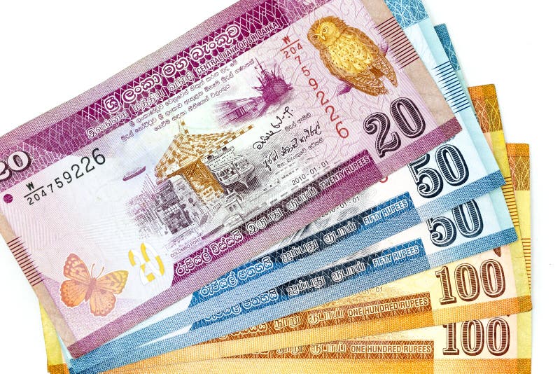 As cédulas da moeda espalharam através da rupia cingalesa do quadro na vária denominação fotografia de stock As cédulas da moeda espalharam através da rupia cingalesa do quadro na vária denominação fotografia de stock