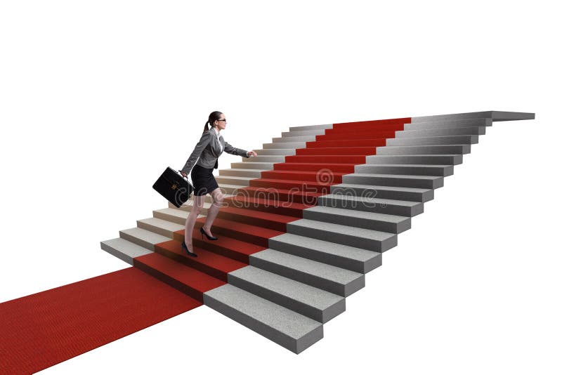 As escadas de escalada da mulher de negócios nova e o tapete vermelho fotografia de stock As escadas de escalada da mulher de negócios nova e o tapete vermelho fotografia de stock