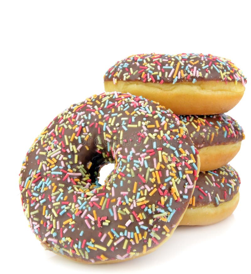 Rosquinhas de chocolate com granulado colorido imagens de stock royalty free