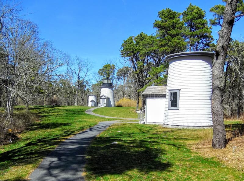 The Three Sisters of Nauset are a trio of historic lighthouses off Cable Road in Eastham, Massachusetts. The original three brick towers fell into the sea due to erosion in 1890 and were replaced with wooden towers on brick foundations in 1892. The Three Sisters of Nauset are a trio of historic lighthouses off Cable Road in Eastham, Massachusetts. The original three brick towers fell into the sea due to erosion in 1890 and were replaced with wooden towers on brick foundations in 1892