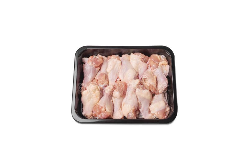 Asas de galinha picantes Carne da galinha no empacotamento em um fundo branco, isolad Foto para desenhistas, para sites imagens de stock royalty free Asas de galinha picantes Carne da galinha no empacotamento em um fundo branco, isolad Foto para desenhistas, para sites imagens de stock royalty free