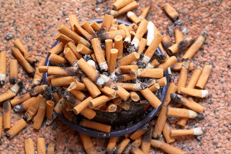 Ashtray full of cigarettes stock photo. Image of ashtray 17451534