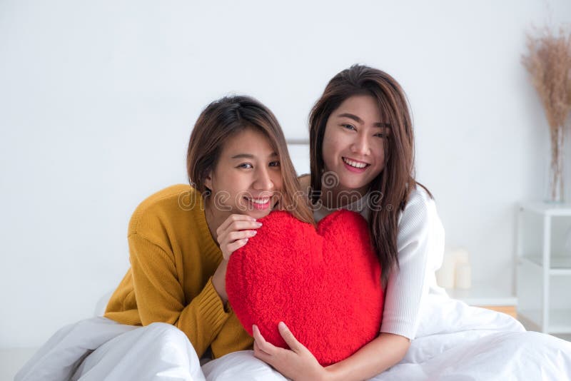 Asia Lesbian Lgbt Couple Holding Red Heart Pillow Together And S Stock