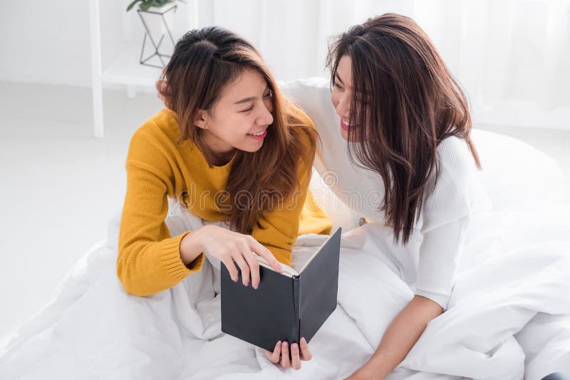 Asia Lesbian Lgbt Couple Hug And Nose Kiss On Rooftop Of Building With