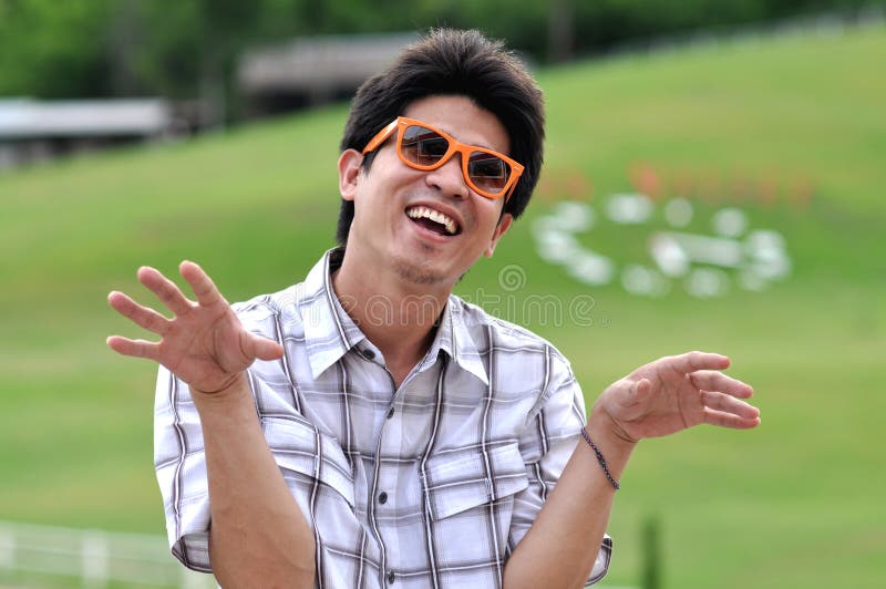 Asia Thailand Man Orange Sunglasses Crazy Smile